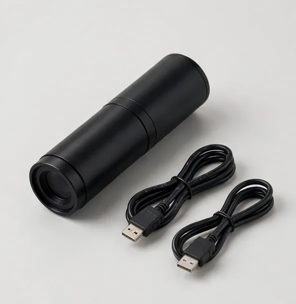 Microscope camera with USB cables on a studio background